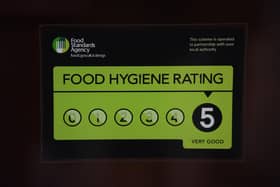 A Food Standards Agency rating sticker will be displayed on a window of a restaurant, pub or takeaway