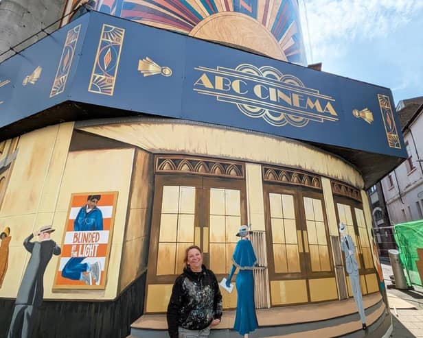 Artist Sarah with her mural. Picture: Sarah Hodgkins