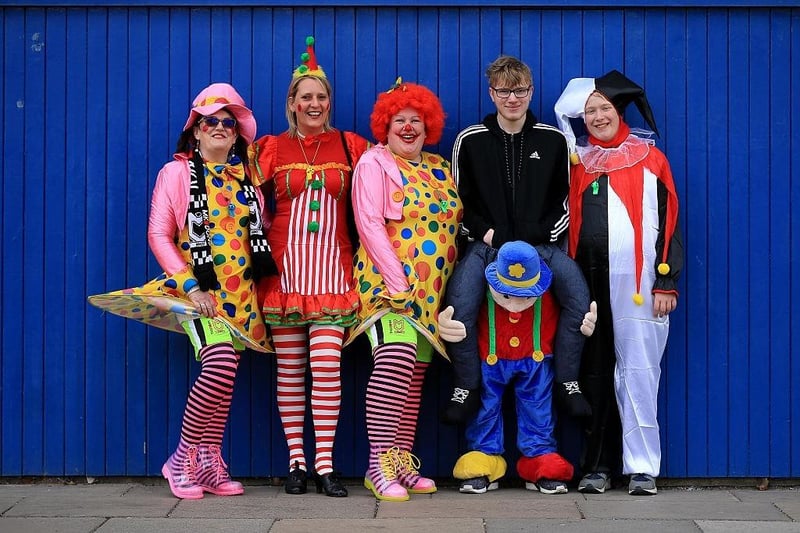 MK Dons fans arrive in fancy dress ahead of the Sky Bet Championship match between Ipswich Town and Milton Keynes Dons at Portman Road on April 30, 2016.