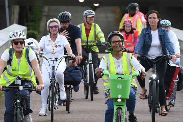 MK Mayor (in white) and High Sheriff (on green bike) lead campaign for women's cycle safety