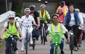MK Mayor (in white) and High Sheriff (on green bike) lead campaign for women's cycle safety
