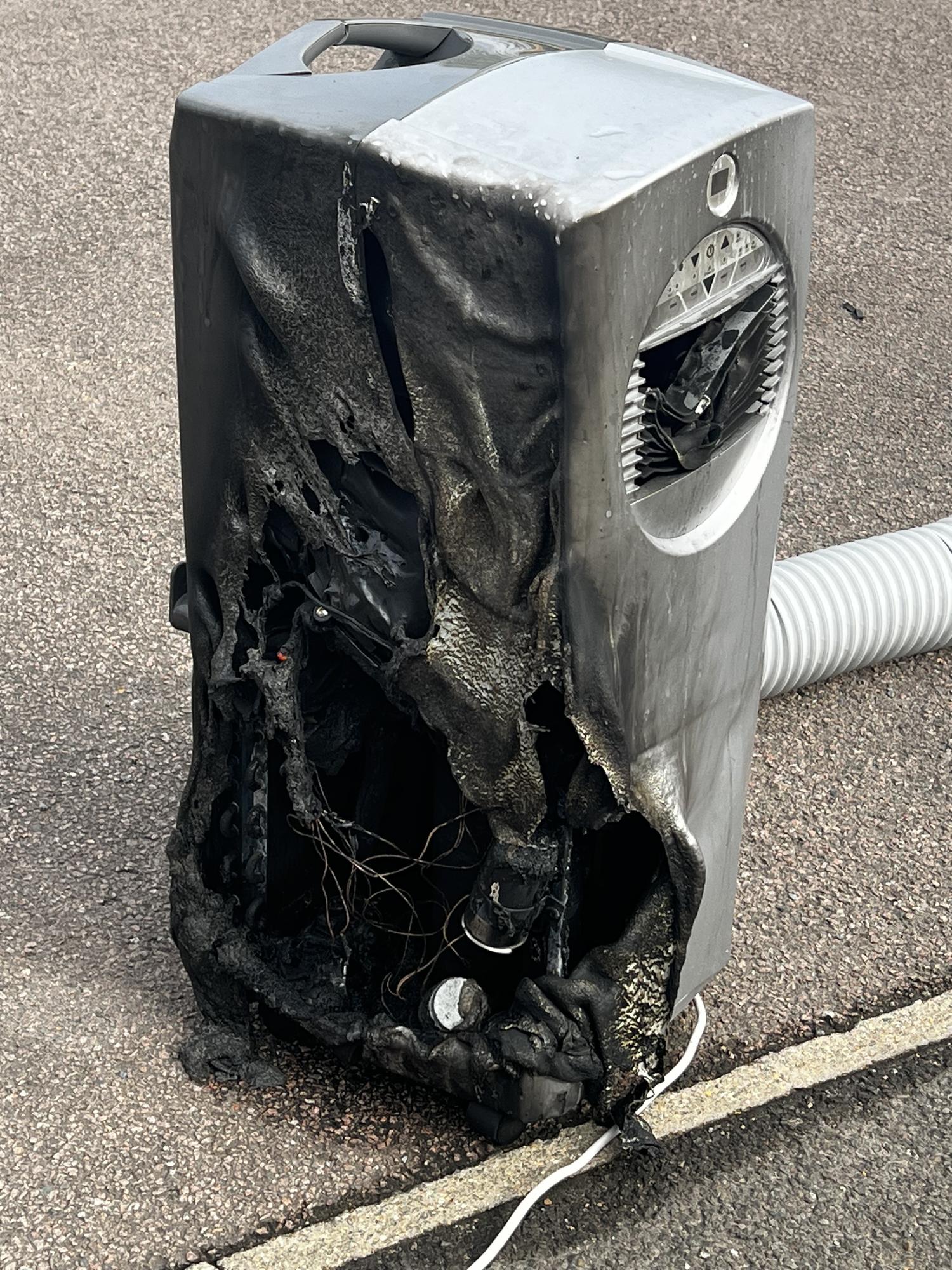 Warning after portable air conditioning unit bursts into flames while ...