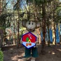Gully Mouse holds the Beavers' badge at Gulliver's Land in Milton Keynes
