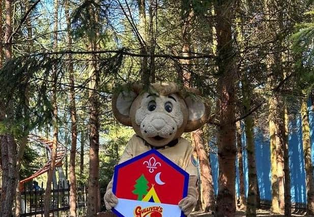 Gully Mouse holds the Beavers' badge at Gulliver's Land in Milton Keynes