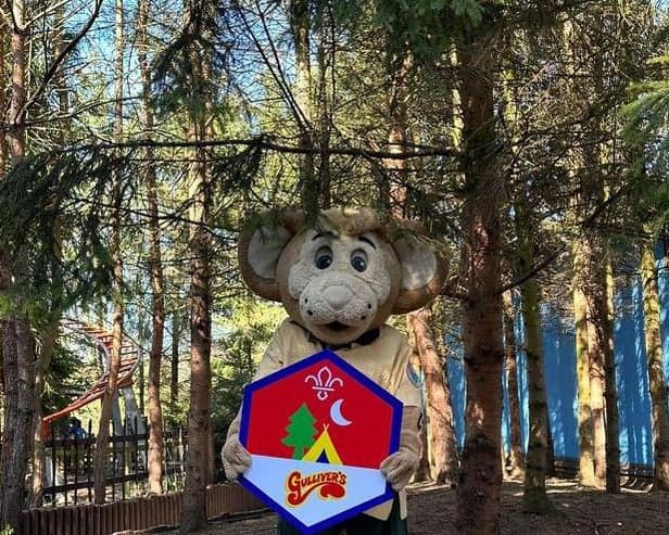Gully Mouse holds the Beavers' badge at Gulliver's Land in Milton Keynes