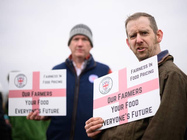 Protesters at Keir Starmer's Milton Keynes visit. (Photo by Leon Neal - WPA Pool/Getty Images)