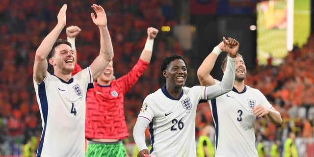 Declan Rice, Kobbie Mainoo and Luke Shaw celebrate after England beat the Netherlands during the UEFA EURO 2024 semi-final match.