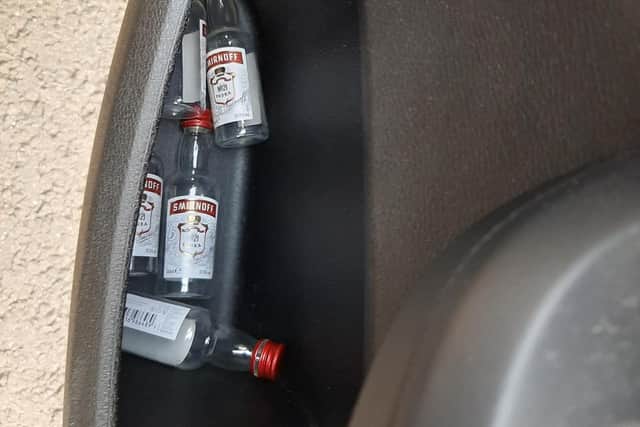 Empty mini bottles of vodka were found in the car