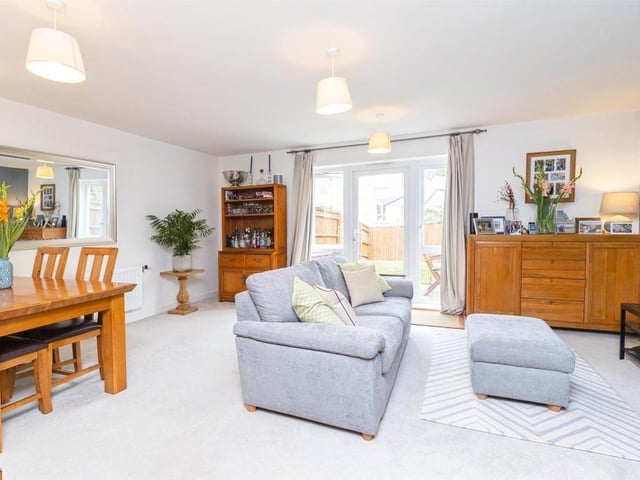 The lounge/diner features a double glazed window and French doors to rear garden