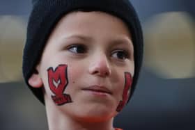 MK Dons have introduced a number of new ticket initiatives to get more fans through the gates.