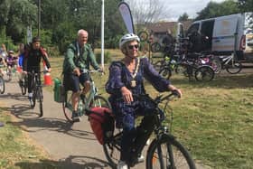 Mayor leads a ride through Coffee Hall