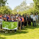 The Parks Trust staff and volunteers celebrate winning the Green Flag award for all Milton Keynes parks