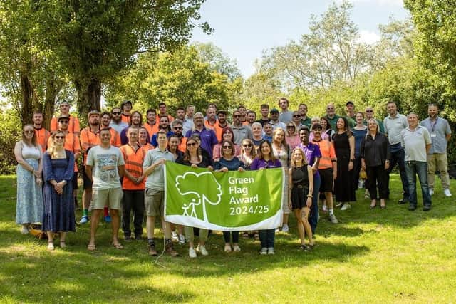 The Parks Trust staff and volunteers celebrate winning the Green Flag award for all Milton Keynes parks