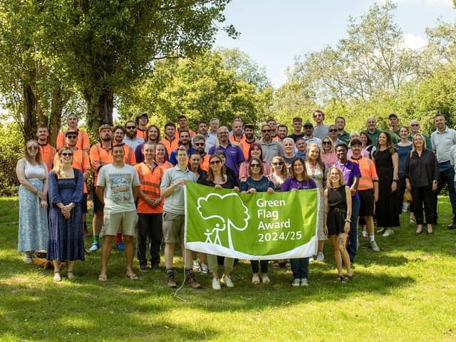 The Parks Trust staff and volunteers celebrate winning the Green Flag award for all Milton Keynes parks