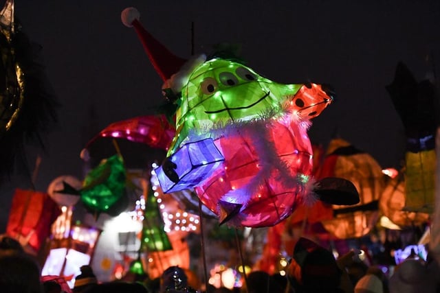 Hundreds of people braved the freezing temperature to support the town's traditional lantern parade