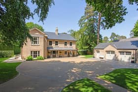 This beautiful house has bags of kerb appeal with gated entrance with sweeping driveway leading to handsome property with garaging, basement and landscaped gardens.