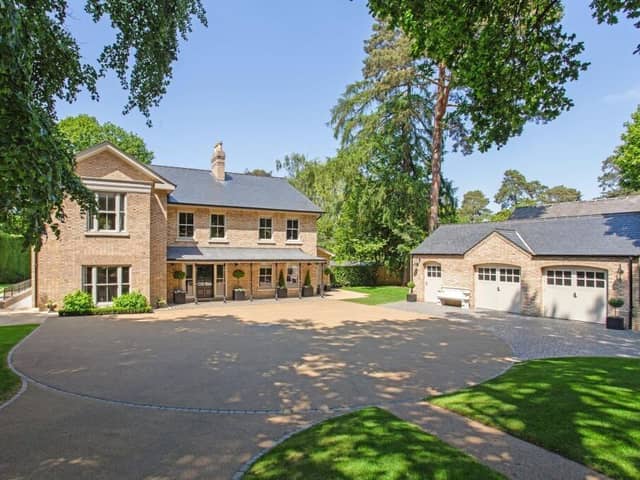 This beautiful house has bags of kerb appeal with gated entrance with sweeping driveway leading to handsome property with garaging, basement and landscaped gardens.