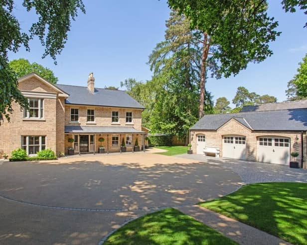 This beautiful house has bags of kerb appeal with gated entrance with sweeping driveway leading to handsome property with garaging, basement and landscaped gardens.