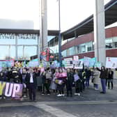 The teachers gathered at the city centre this morning