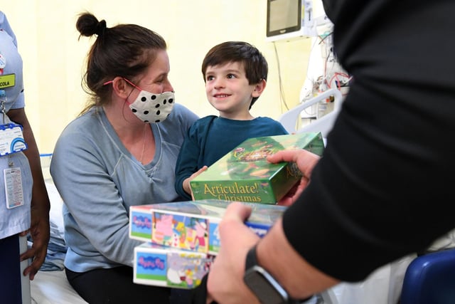 Big smiles as the presents are handed out