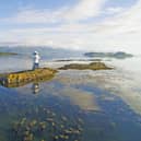 The view across Loch Linnhe to the Morvern Mountains with the Sgeir Bhuidhe Lighthouse in the foreground