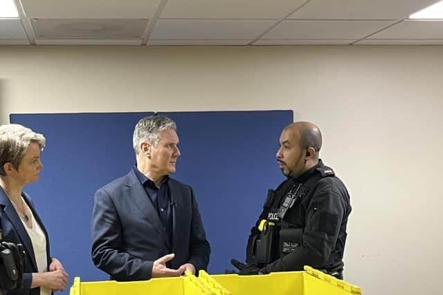 Shadow home secretary Yvette Cooper, and Sir Keir Starmer speaking to police officers at Milton Keynes Police Station last Thursday - hours before a murder took place in the city
