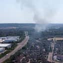 The smoke could be seen from across the city. Photo:  Sham Hussain Photography