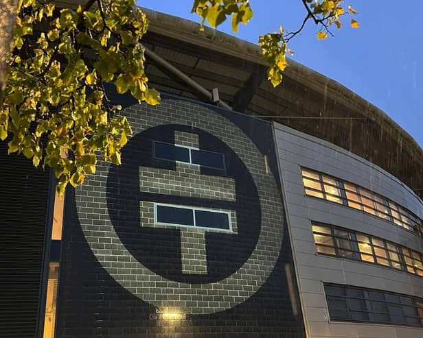 The distinctive Take That logo has appeared in lights on the wall of Stadium MK, dropping a strong hint that the band will perform there next year