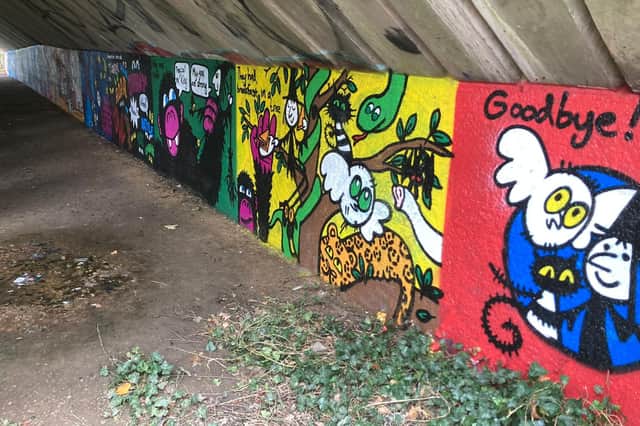 The story of 'Mog at the Zoo' has been painted on this underpass near Newport Pagnell, under the M1 in Milton Keynes