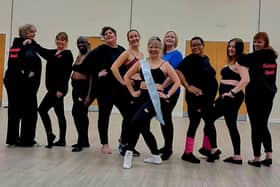 CLICK Arts Burlesque Squad perform -in their uniforms provided by local MK Sikh community business RAUR Gymwear