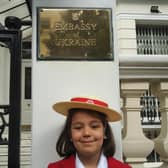 Madison outside the Ukrainian Embassy in London