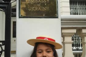 Madison outside the Ukrainian Embassy in London