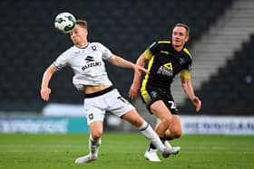 MK Dons loan player Dan Kemp has been labelled League Two's best player so far this season after a cracking start with Swindon Town.