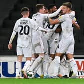 MK Dons made seven changes to the side to face Morecambe on Tuesday, but Liam Manning is likely to revert back to the side which has found form in the league against Derby