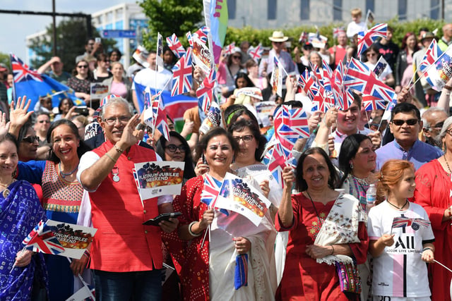 The parade was a sea of red and white blue flags as people joined in the historic occasion
