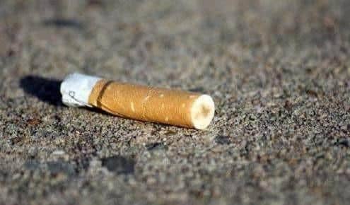 The pensioner dropped her cigarette end on the ground before getting in a cab in MK
