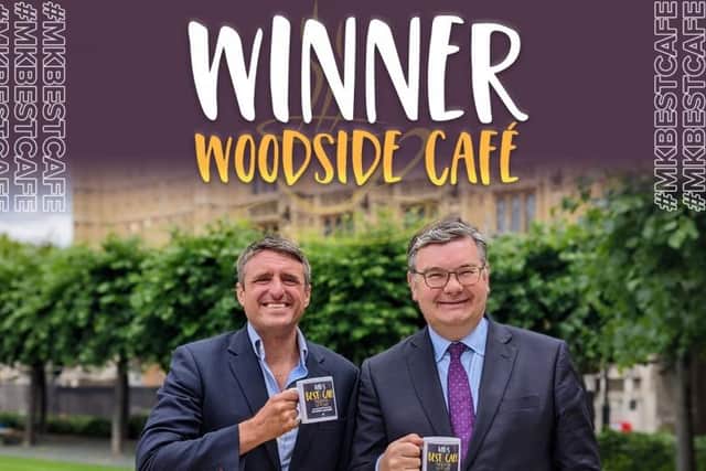 MPs Ben Everitt and Iain Stewart pose outside the winning cafe