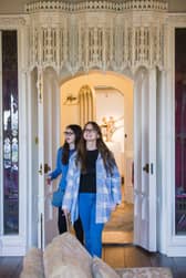 Visitors react at walking into the Gothic Library at Stowe House.