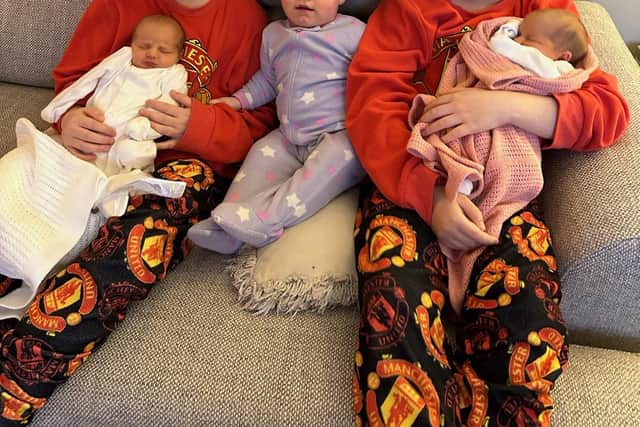Twins Franklin and Freddie and one-year-old Rosie with their new twin sisters.