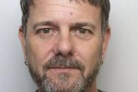 Simon Brown is wanted by Northamptonshire Police following a burglary in Towcester.