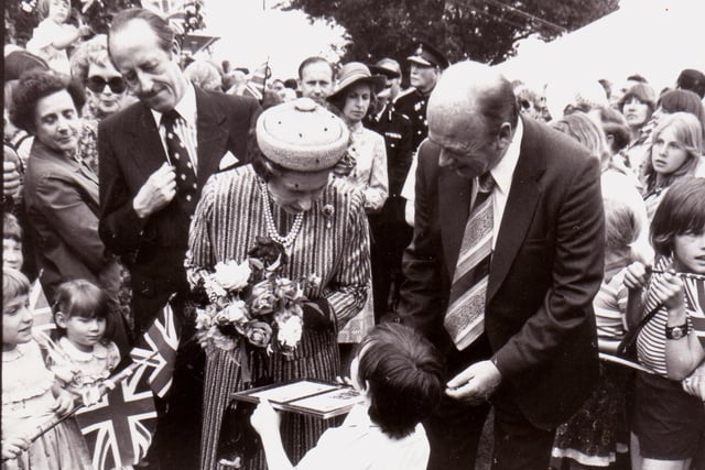 The Queen is presented with gifts on her visit to MK in 1979. Photo: Living Archive MK