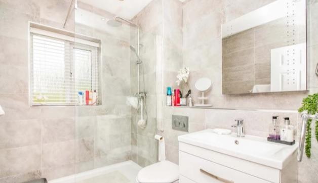 The bathroom in the property, it has been refitted and contains everything you'd need and expect, including a heated towel rail and extractor fan.