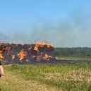 Around 75,000sq m of the field was ablaze