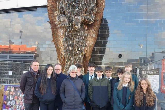 Melanie Beck with young people on an Action4Youth educational programme at The Knife Angel when it visited Milton Keynes last December