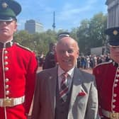 Roger before he went inside Buckingham Palace