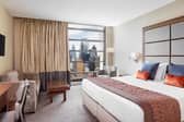 A superior double room at Leonardo Royal London Tower Bridge with magnificent views of the capital's skyline.