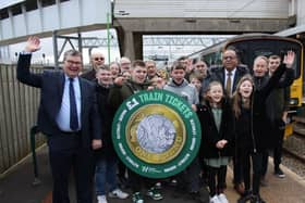 Rail users and members of Marston Vale Community Rail Partnership with Iain Stewart MP and Mohammad Yasin MP at Bletchley Station, celebrating the relaunch of the full Marston Vale Line timetable