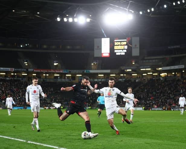 A computer prediction is tipping MK Dons to have a major slump in form for the rest of the season.