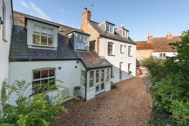 This original, stone, brick and slate late Victorian cottage has been tastefully upgraded and maintained added to create a versatile, modern family home.