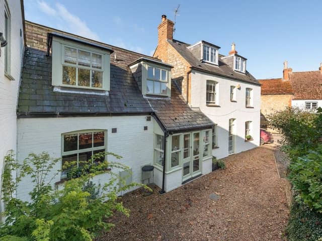 This original, stone, brick and slate late Victorian cottage has been tastefully upgraded and maintained added to create a versatile, modern family home.